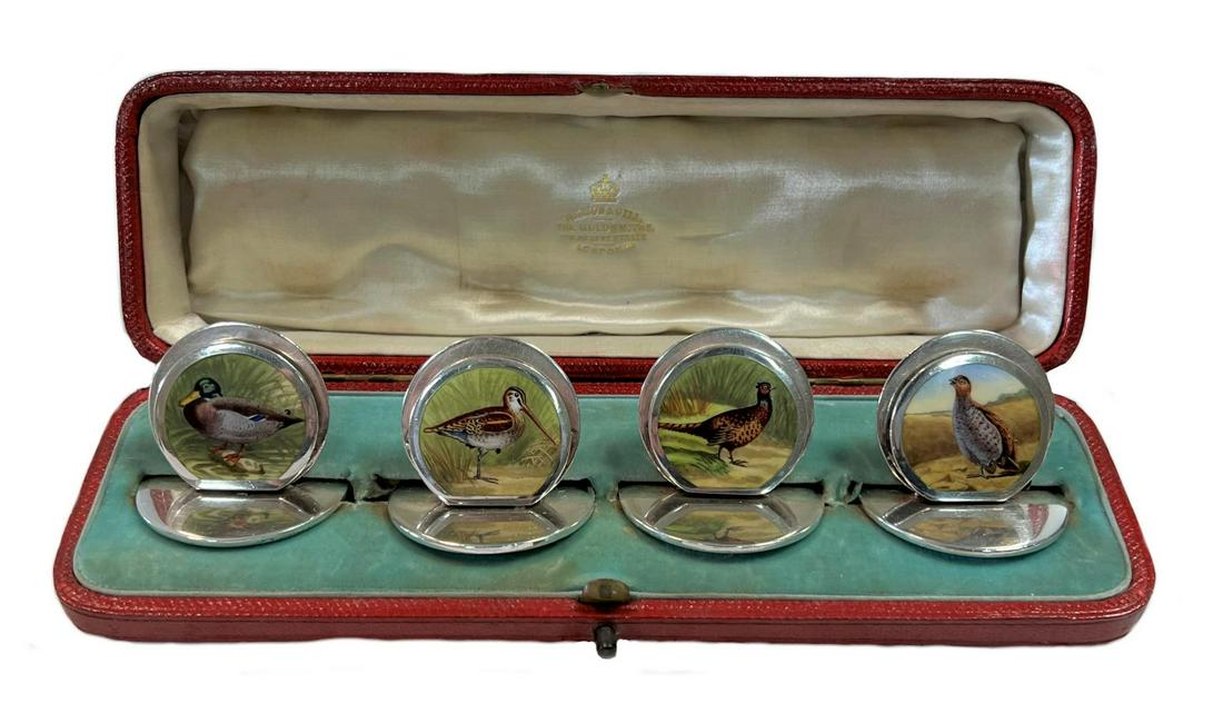 A set of four early 20th century silver and enamel menu holders, mark of Sampson Mordan & Company, (1 of 9)