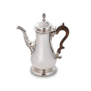 A George III 18th century silver coffee pot,: A George III 18th century silver coffee pot, mark of William Grundy, London, date letter very rubbed, possibly 1762, of traditional plain baluster form, part marked piano hinged domed cover topped wit