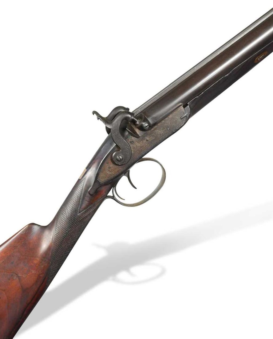 William Smith, Princes Street, London, a percussion cap sporting gun, No 2788,: William Smith, Princes Street, London, a percussion cap sporting gun, No 2788, the 29" damascus barrels with ramrod below, the frame with foliate scroll engraving