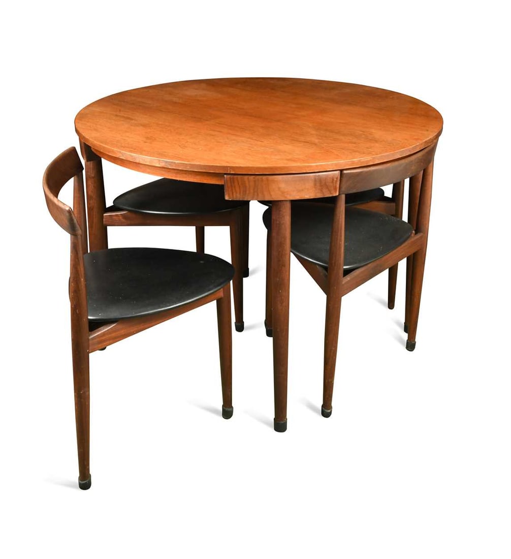 Hans Olsen for Frem Rojle, a Danish teak dining table and four hideaway chairs, circa 1965, the: Hans Olsen for Frem Rojle, a Danish teak dining table and four hideaway chairs, circa 1965, the contours of the three-legged chairs designed to fit exactly around the table, branded marks 74 x 106cm