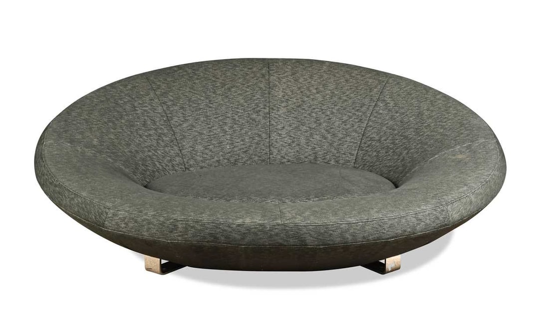 Jane Worthington for De Sede, a DS152 oval sofa, with original grey fabric upholstery, raised on a: Jane Worthington for De Sede, a DS152 oval sofa, with original grey fabric upholstery, raised on a flattened chrome base 71 x 192 x 150cm