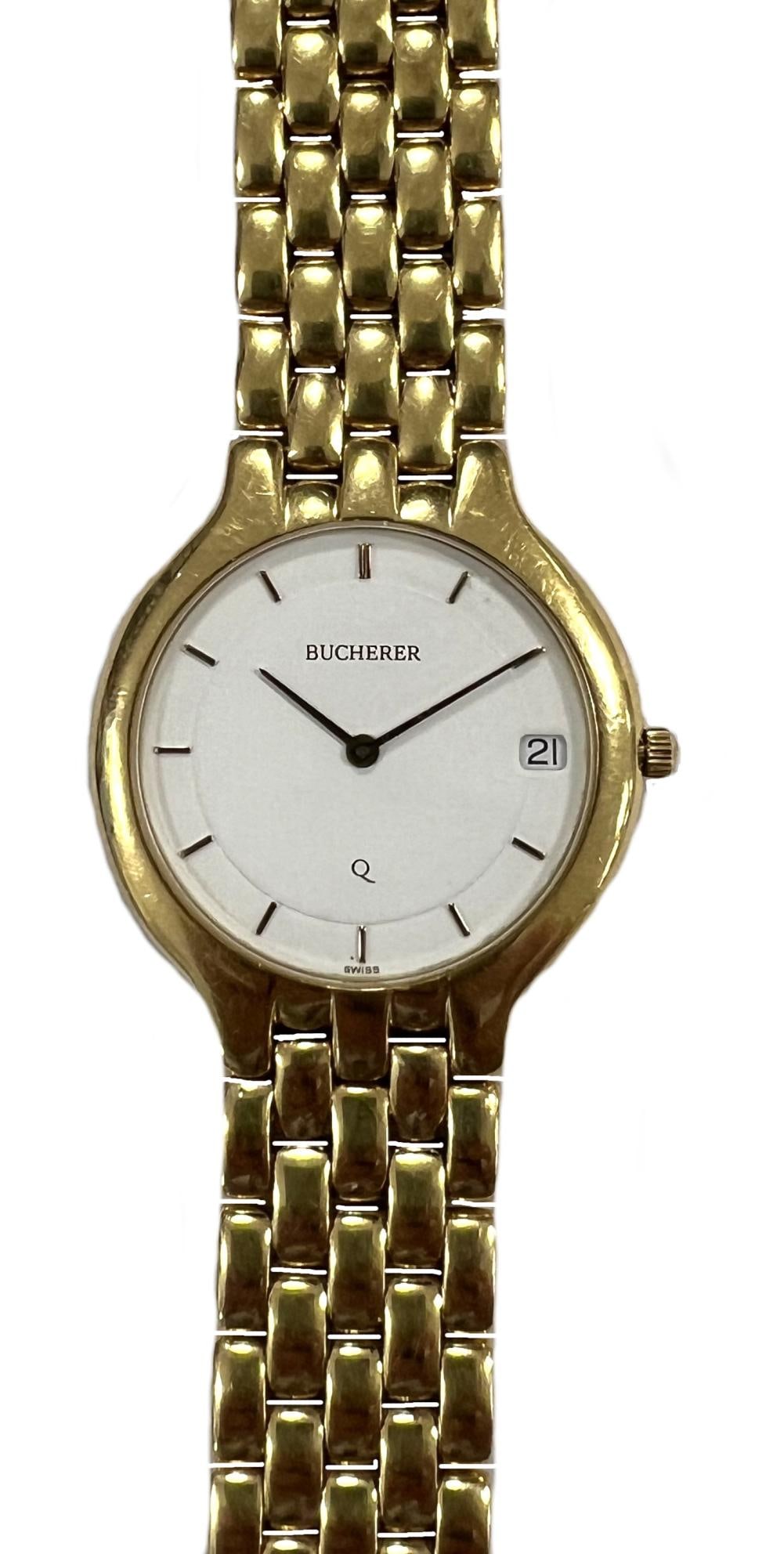 Bucherer - A Swiss 18ct gold wristwatch, late 20th century, model number 255 103, serial number: Bucherer - A Swiss 18ct gold wristwatch, late 20th century, model number 255 103, serial number 24481, the signed circular white dial, 26mm, with gold coloured batons and hands and date window at 3 o'