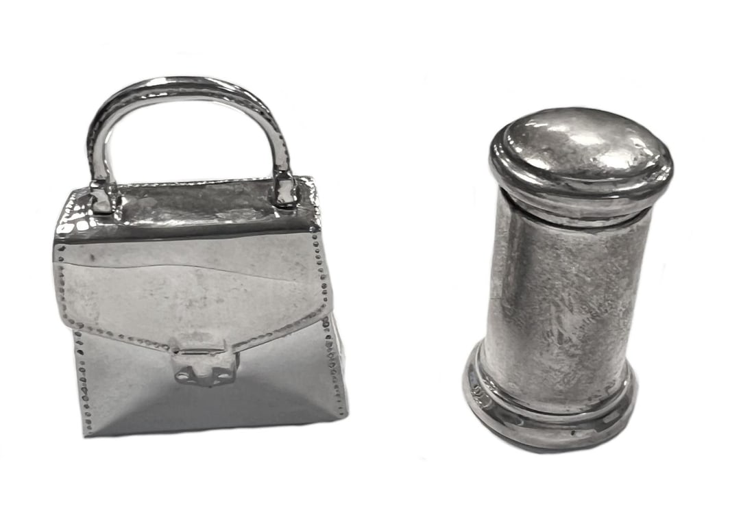 Two 20th century novelty pill boxes, marks of Tiffany & Co. and Asprey & Co., the first, modelled in (1 of 9)