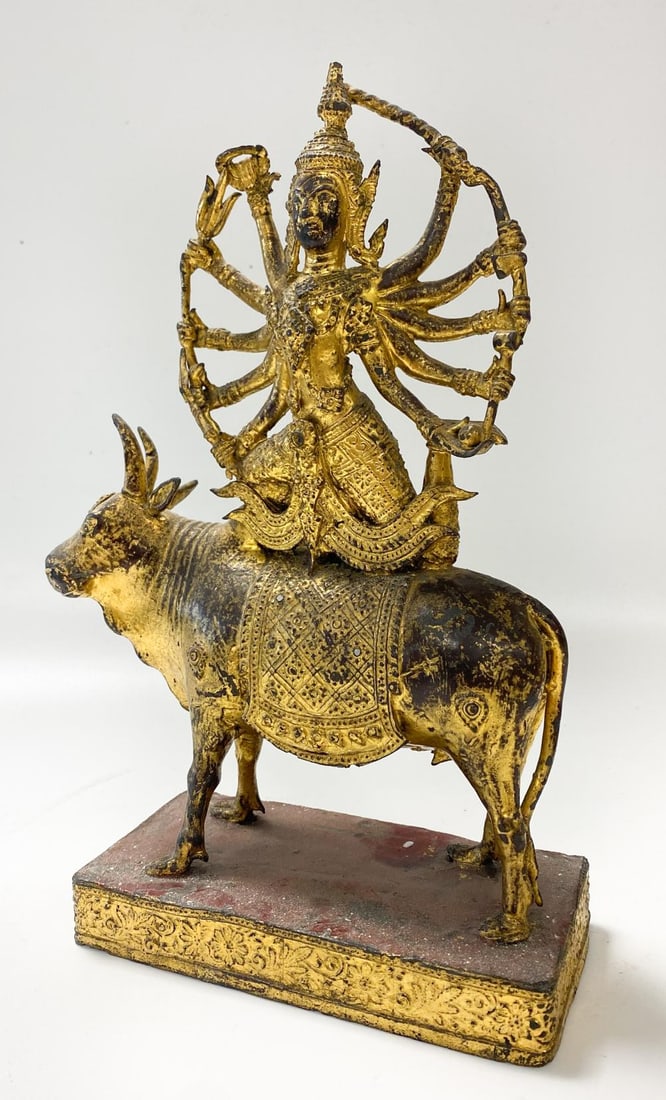 A Thai (Rattanakosin) gilded and red-painted bronze of Shiva upon the Nandi Bull, 19th/20th century, (1 of 6)