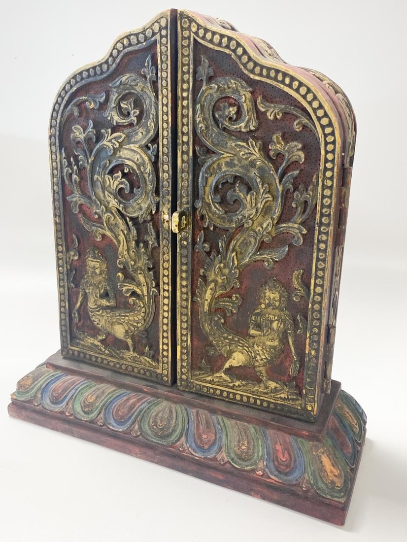 A Tibetan wood encased tsa tsa shrine, 20th century, (1 of 9)