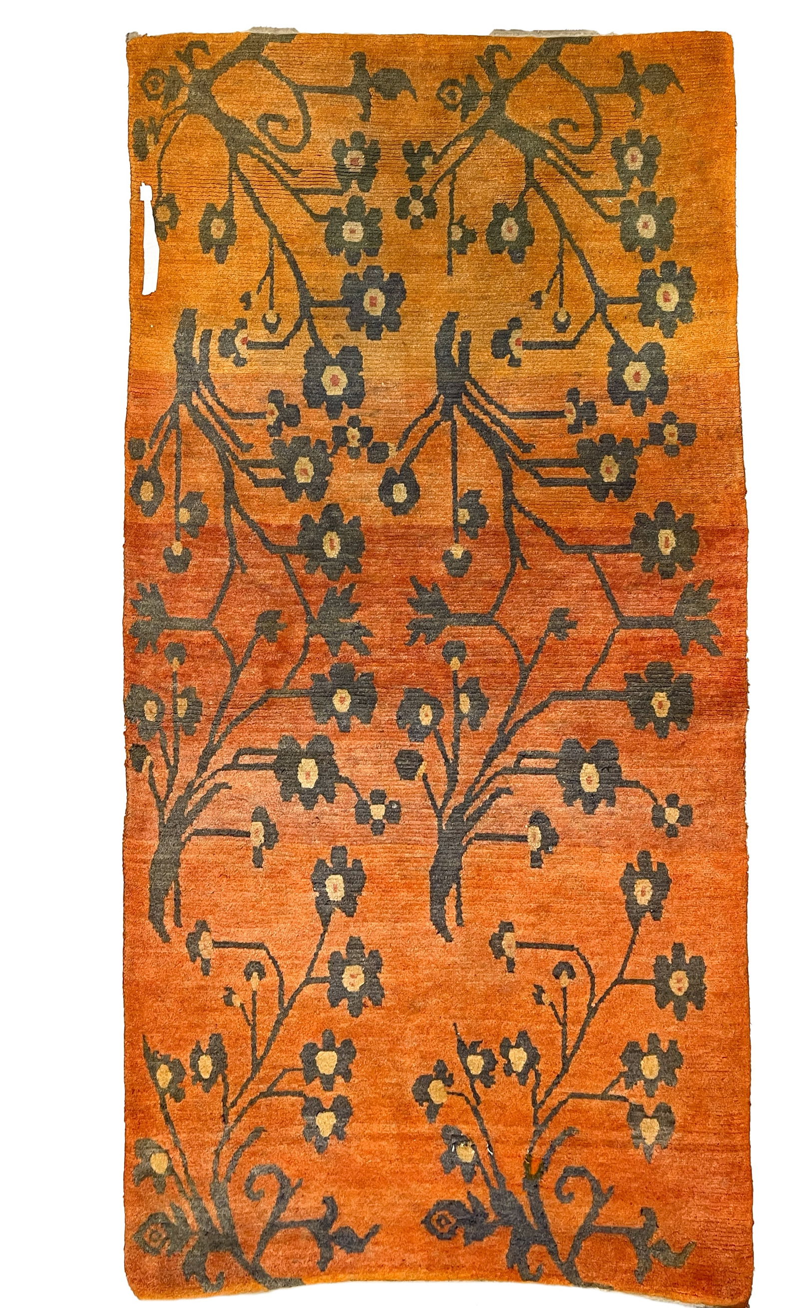A Tibetan wool orange ground rug, circa 1930, (1 of 1)