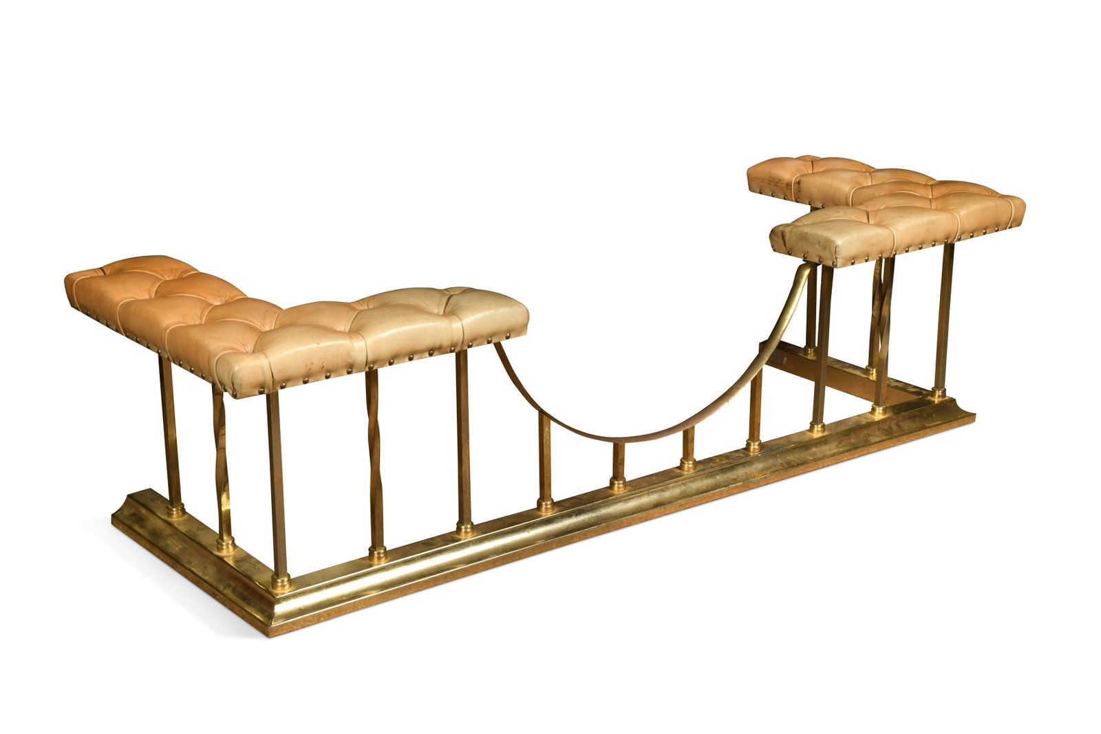 A brass and leather club fender, 20th century,: A brass and leather club fender, 20th century, the padded seats upholstered in a buttoned leather on spiral and square section supports 49 x 63 x 181cm internal measurements: 154 x 51cm