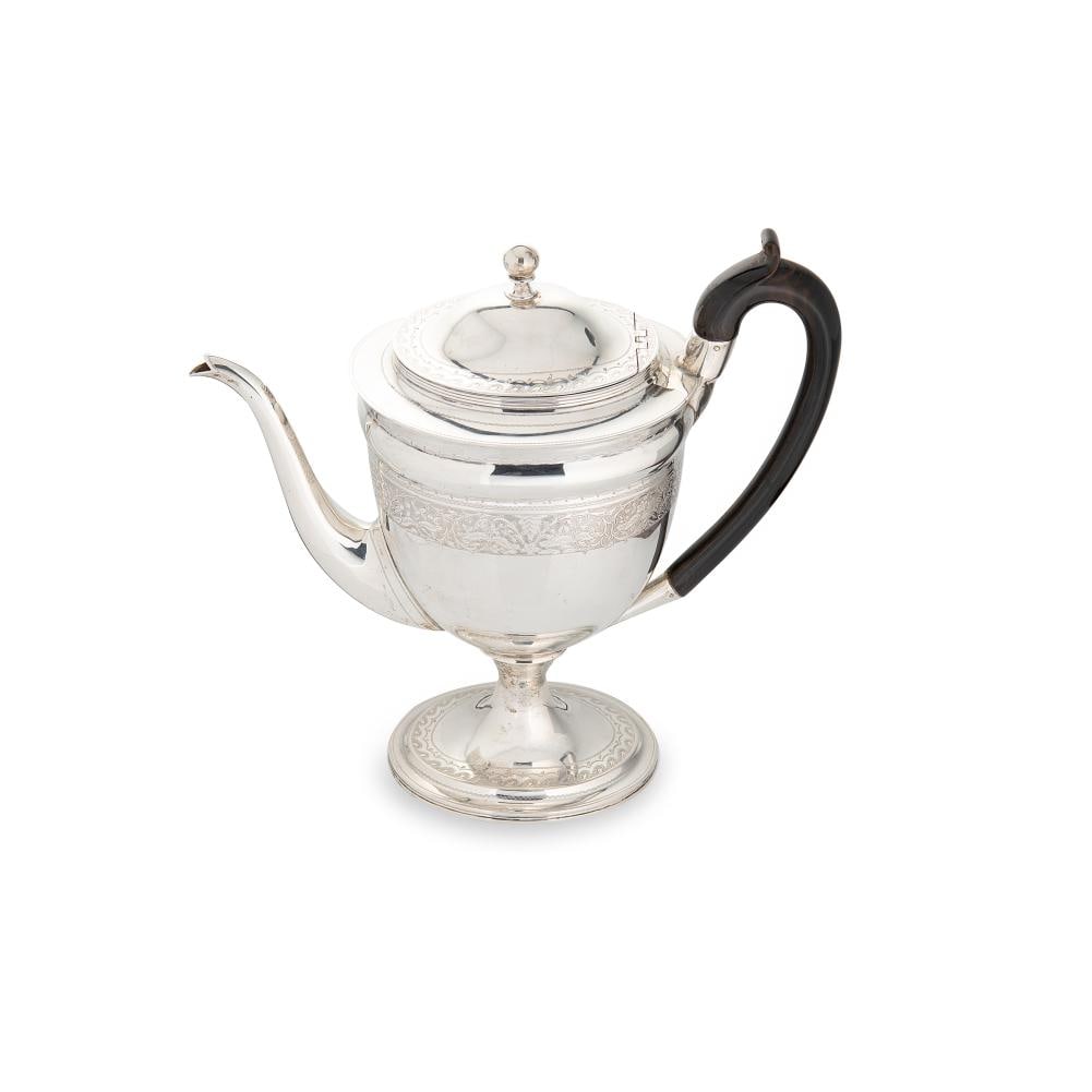 An Edward VII silver coffee pot,: An Edward VII silver coffee pot, mark of Charles Stuart Harris, London 1901, in the Queen Anne style, of oval tapering form, upper with a band of foliate engraving and bright cut banding, the body eng