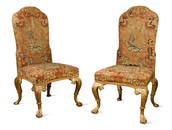 A pair of George II style giltwood side chairs, 19th century,