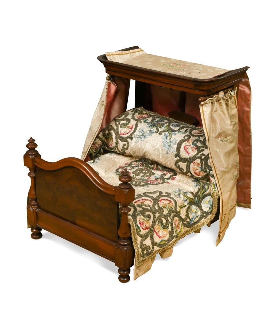 A Victorian miniature mahogany half-tester dolls' bed, (1 of 7)