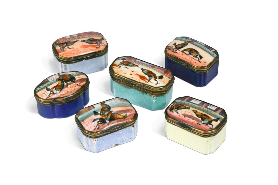 A group of six enamel cockfighting snuff/pill boxes, 19th century,: A group of six enamel cockfighting snuff/pill boxes, 19th century, each decorated to the hinged lids with cockfighting scenes the largest 2.5 x 6 x 3.5cm