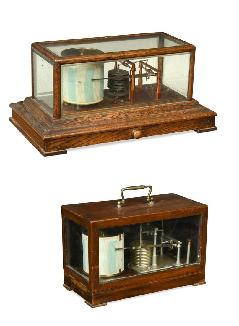 A Negretti and Zambra oak barograph,: A Negretti and Zambra oak barograph, with copper gilt "Regency Jewelled Movement", in glazed case 42cm wide; together with a Short and Mason mahogany barograph, with silvered mechanism, in hinged glaz