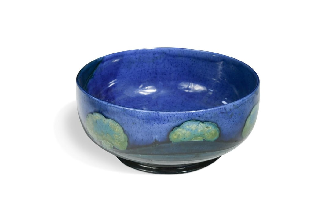 A Moorcroft 'Moonlit Blue' pattern bowl,: A Moorcroft 'Moonlit Blue' pattern bowl, the high-sided body tube-lined internally and externally with a design of trees and bushes over a dark blue ground, impressed and painted marks to underside 10
