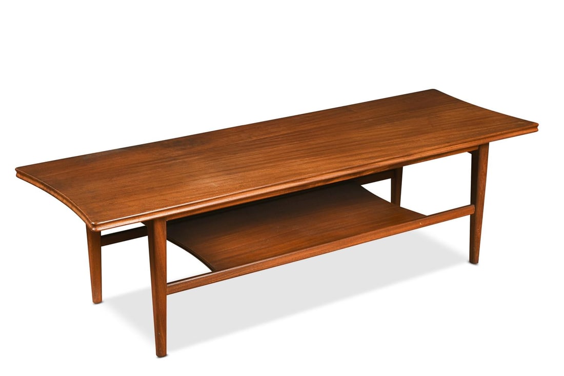 Richard Hornby for Fyne Ladye, a mid-century afromosia coffee table,: Richard Hornby for Fyne Ladye, a mid-century afromosia coffee table, the rectangular top with concave end on tapering legs with undertier below 35.5 x 121 x 40.5cm