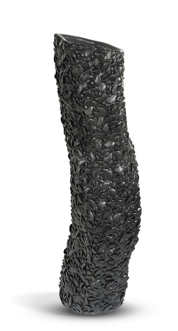 § Gilles Caffier, a large textured vase,: § Gilles Caffier, a large textured vase, of twisted cylindrical form, in black gloss glaze and with textured 'scaled' surface, reference VA172DB, with plaque and incised signature and incised date 20