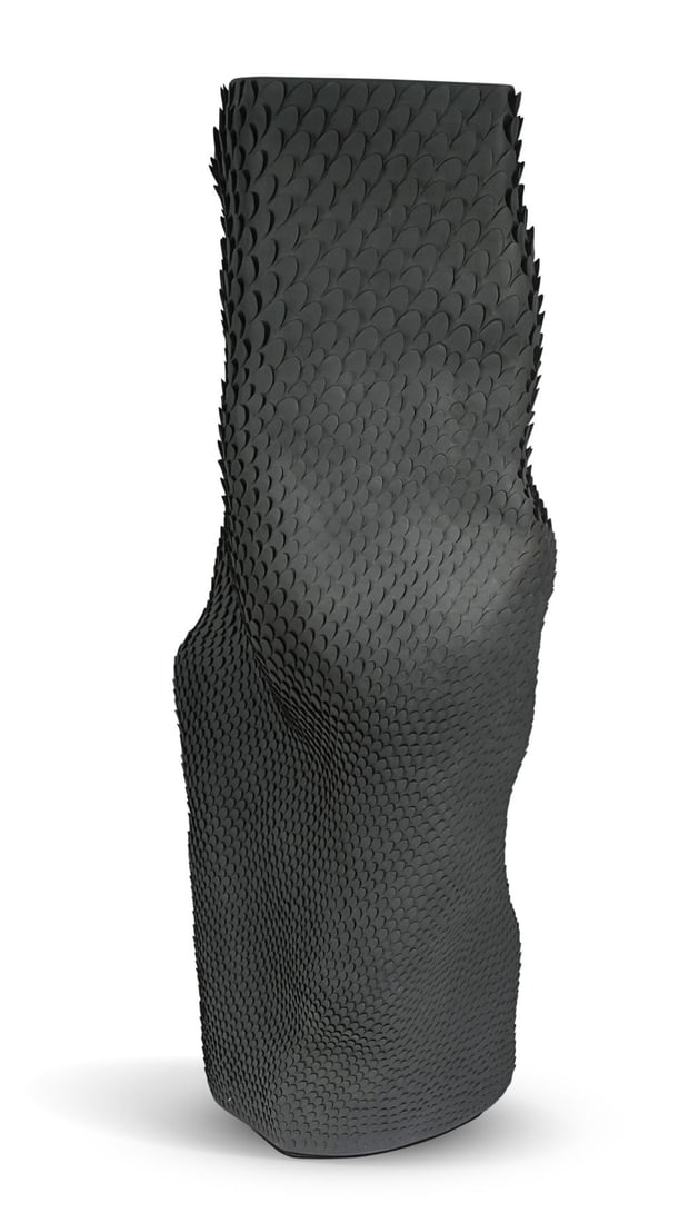 § Gilles Caffier, a large 'Pangolin' vase,: § Gilles Caffier, a large 'Pangolin' vase, of dimpled cylindrical form, in matte black glaze and with textured 'scaled' surface, reference VA161DB, with plaque and incised signature and incised date