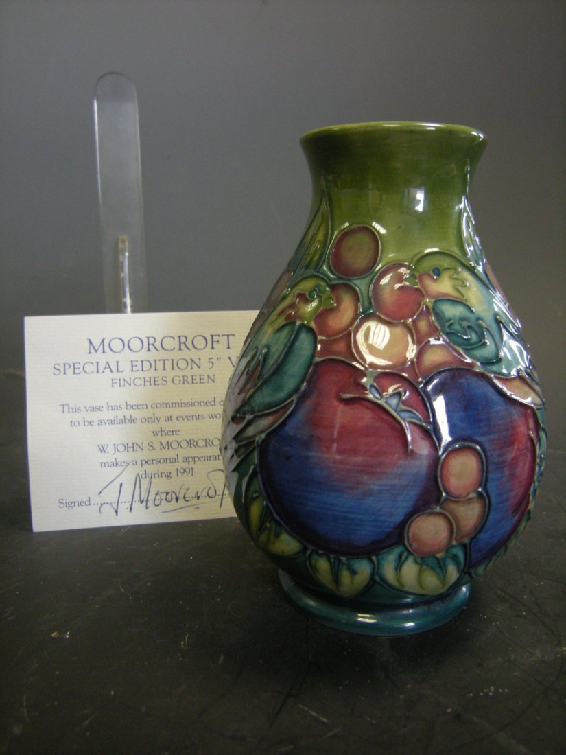 A Moorcroft Finches Green pattern vase,: A Moorcroft Finches Green pattern vase, signed and dated by W. John S. Moorcroft, 1991, together with certificate of authenticity 14cm (5in)