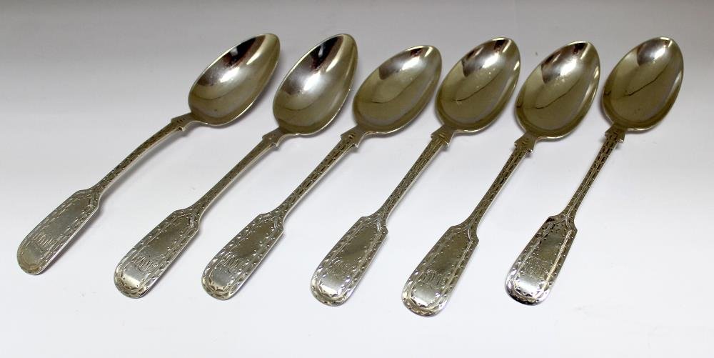 Six Victorian silver bright cut fiddle pattern: Six Victorian silver bright cut fiddle pattern teaspoons, by John Goodman or J P Genge, Exeter 1876, initialled, 14.5cm, 3.93oz (6)