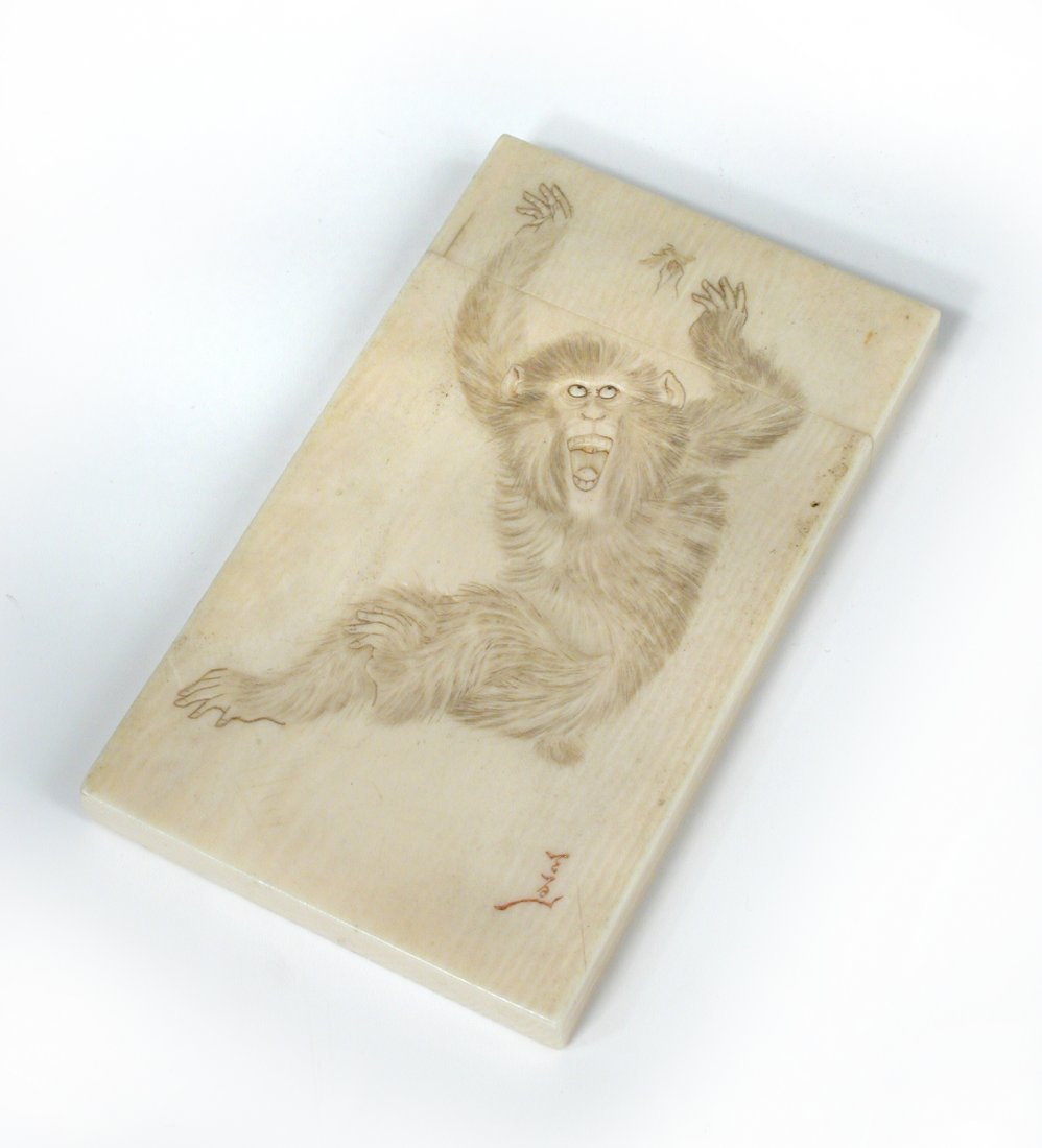 An early 20th century ivory card case,: An early 20th century ivory card case, intaglio carved on one side with a monkey leaping for an insect while its child on the other crawls across rocks for one, signed, 9.5 x 5.5cm (3.75 x 2.25 in.) (