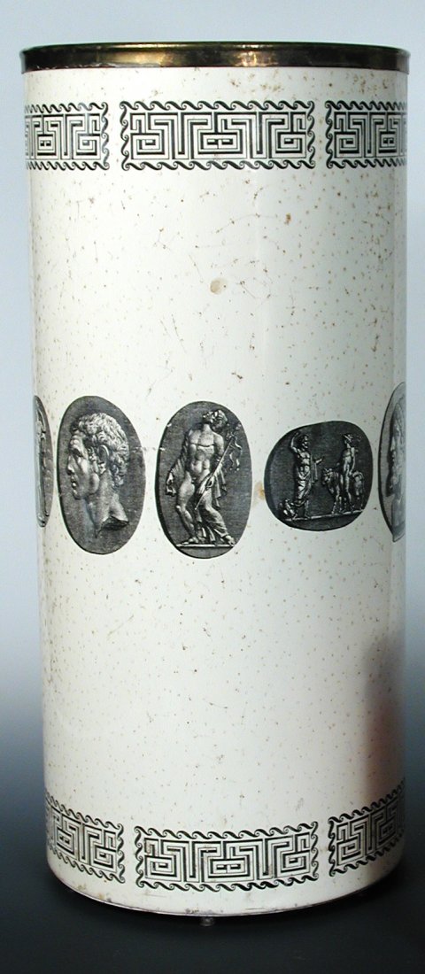Piero Fornasetti for Fornasetti Milano, a transfer: Piero Fornasetti for Fornasetti Milano, a transfer printed umbrella stand, circa 1955, the cylindrical body of enamelled tin with brass rim and feet, decorated with a central band of Classical medalli
