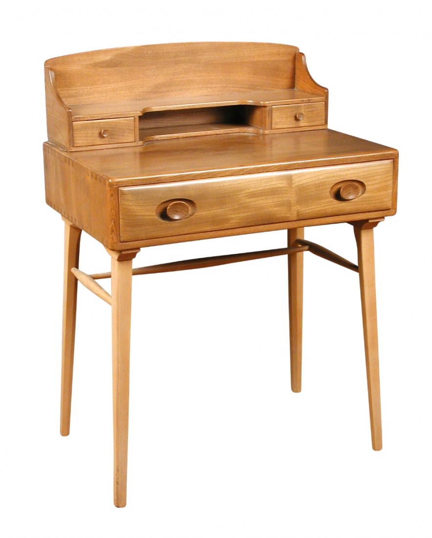 A mid twentieth century Ercol light elm desk,: A mid twentieth century Ercol light elm desk, with single frieze drawer and raised superstructure, together with two Ercol dining chairs (3)