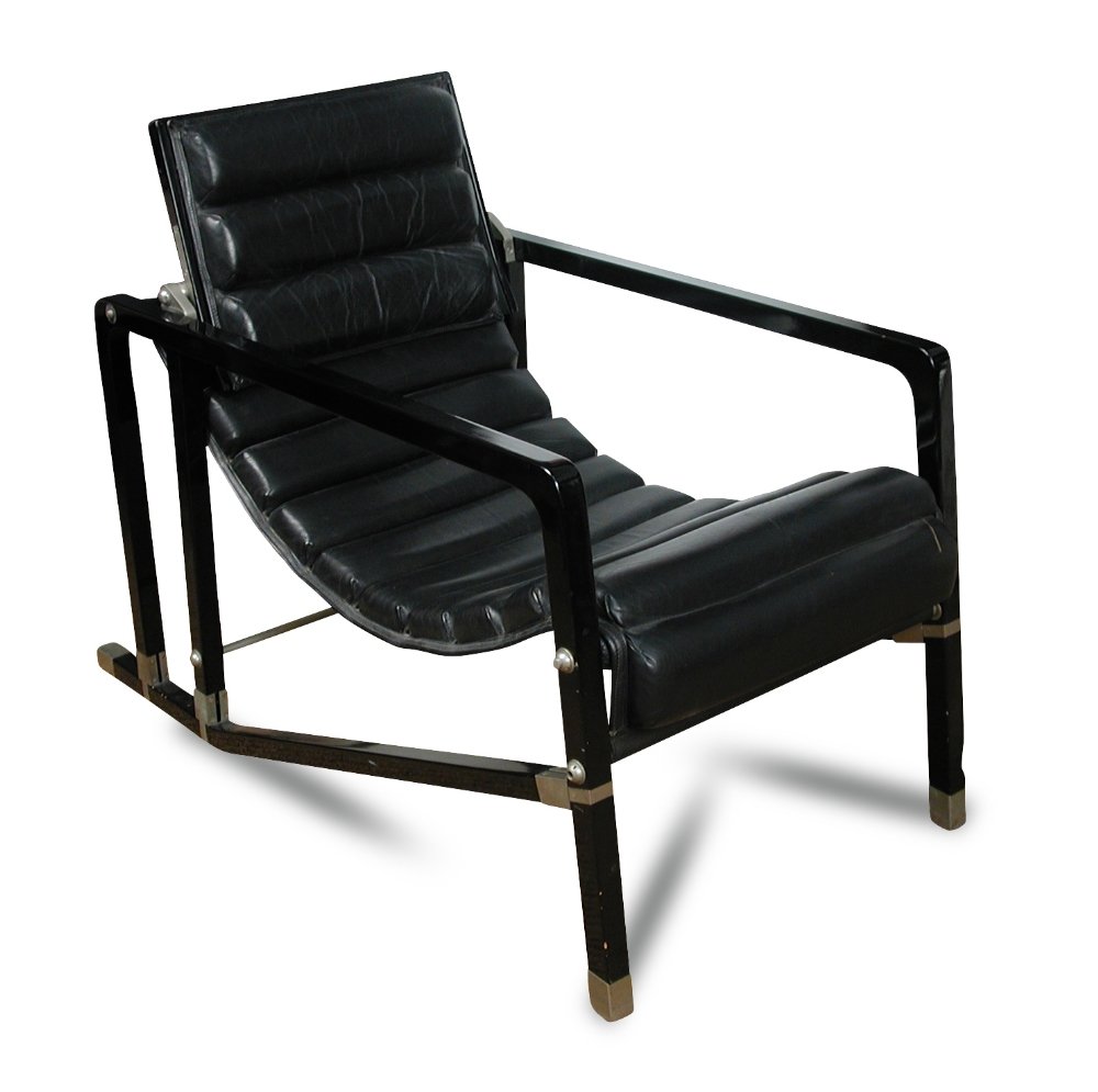 Eileen Gray, (1878-1976), a black lacquer Transat: Eileen Gray, (1878-1976), a black lacquer Transat chair, circa 1975, originally designed 1925, produced by André Putnam, chromed metal, lacquered wood and black leather 78 x 56 x 108cm (30 x 22 x 42i