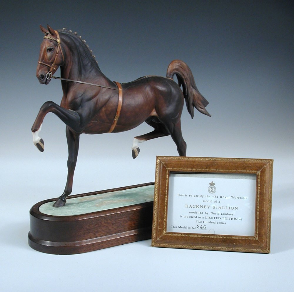 A 1975 Royal Worcester 'Hackney Stallion' by Doris: A 1975 Royal Worcester 'Hackney Stallion' by Doris Lindner, Number 246 of 500, the bay doing a high stepping trot across the green sward base, printed marks and leather framed certificate, the horse 2