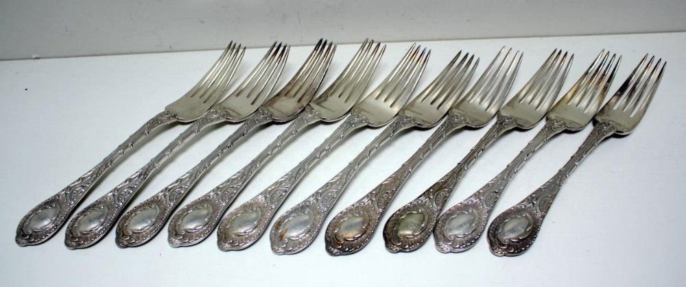 Ten Russian silver table forks, of heavy shell, scroll: Ten Russian silver table forks, of heavy shell, scroll and reed pattern, St Petersburg 1882-1889, (x 8) and St Petersburg 1895 (x 2, assay master probably Alexander Sevier), maker Mikail Grachev and o