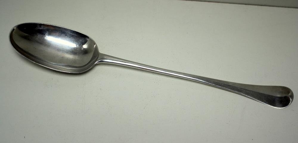A George I Hanoverian pattern rattail stuffing spoon,: A George I Hanoverian pattern rattail stuffing spoon, by Thomas Mann, London 1721, 34cm, 5.2oz