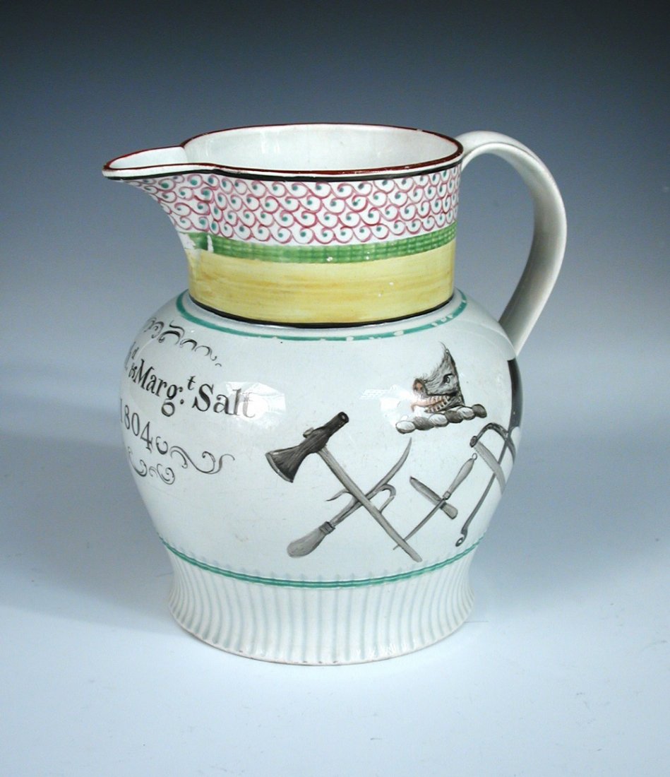 Richard Margaret Salt 1804', a pearlware jug: Richard Margaret Salt 1804', a pearlware jug painted with butcher's tools below a hog's head crest on one side and printed with Diana hunting a stag with the aid of two amorini on the other above a re