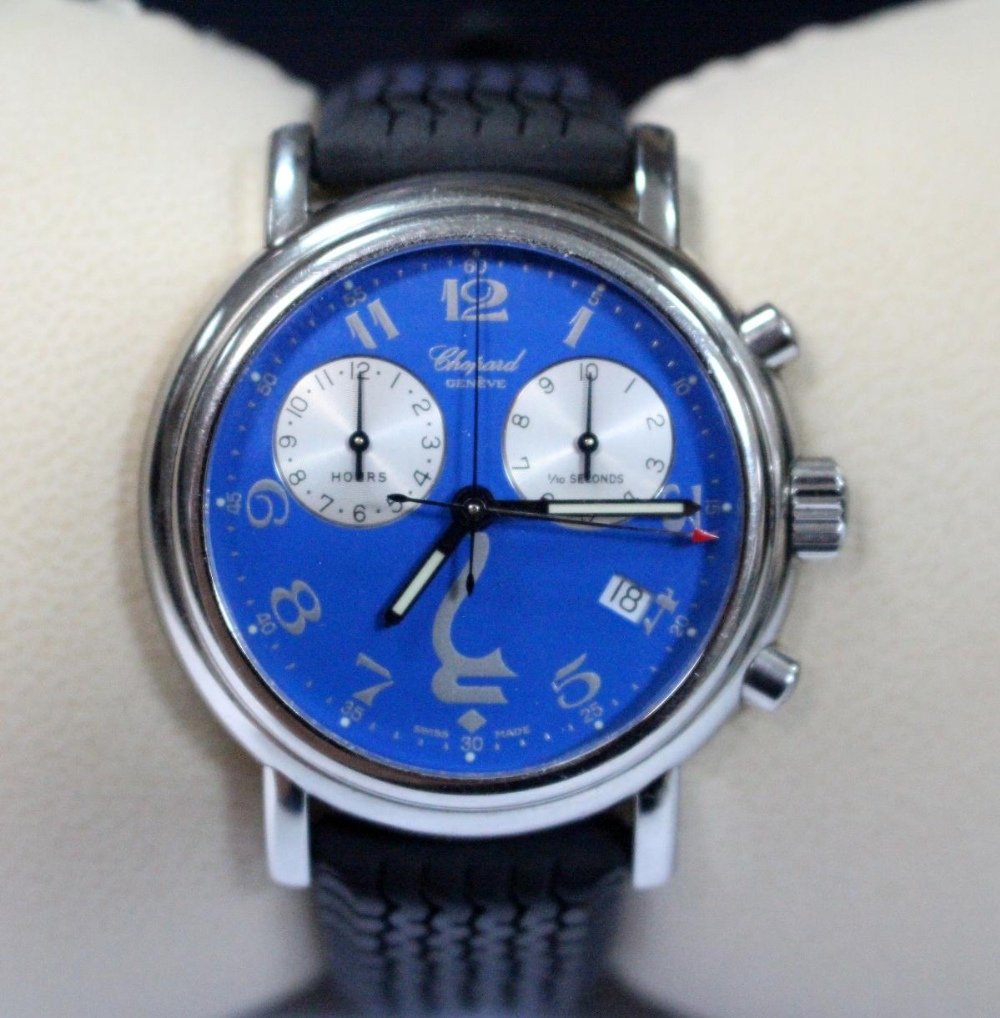 Chopard - a gentleman's presentation wristwatch: Chopard - a gentleman's presentation wristwatch with blue dial with Arabic numerals, centresweep seconds and two subsidiary dials showing 1/10th seconds and hours, date aperture, the dial bearing the