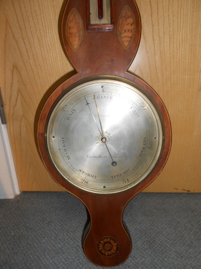 A 19th century mahogany and inlaid wheel barometer, (1 of 3)