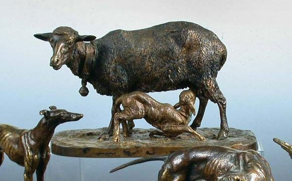 Pierre Jules Mene a bronze ewe and lamb group: Pierre Jules Mene (1810-1871) a bronze ewe and lamb group Brebis Allaitant Son Agneau once possibly painted black and now partially cleaned 15cm high