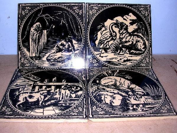 FOUR MINTON TILES - AESOPS FABLES: A set of four 1880's Minton and Hollins Aesops fable tiles, to include: 'Death and the Woodman', 'The Dog and his Shadow', 'The Fox and the Stork and 'The Wolf and the Pig', 15.5 x 15.5cm (4)