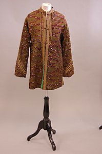 A Thea Porter printed snakeskin-effect jacket, la: A Thea Porter printed snakeskin-effect jacket, labelled, nehru-style edged in gold braid, green lurex striped lining, chest 102cm, 40in