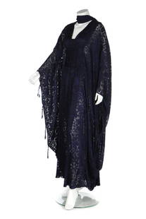 A Thea Porter midnight-blue cut-velvet kaftan, mid: Description: A Thea Porter midnight-blue cut-velvet kaftan, mid 1970s, couture labelled, edged with silk cord, interior waistband; with matching scarf (2) Condition Report: good condition, no problems