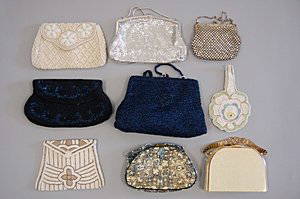 A group of evening/vanity bags 1930s-50s, including: A group of evening/vanity bags 1930s-50s, including three beaded examples, embossed leather and a Stratton vanity case, the largest 9cm, 7 1/2in (9)