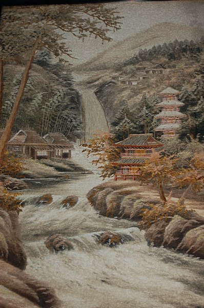 An embroidered landscape picture, Japanese, circa