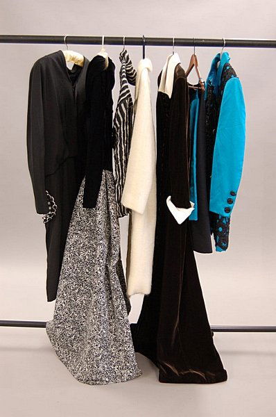 A group of mainly 1980s fashion, six ensembles in: A group of mainly 1980s fashion, six ensembles including Balmain couture velvet and silk full length evening gown with paisley-shaped embroidered and beaded pockets; a Guy Laroche turquoise satin suit