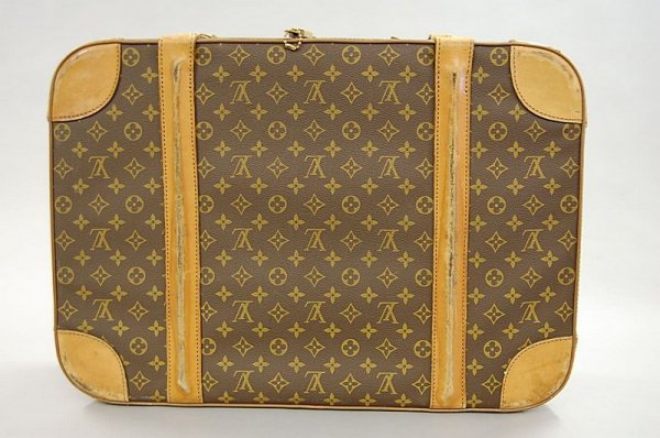 A Louis Vuitton soft-sided suitcase, probably 1960s