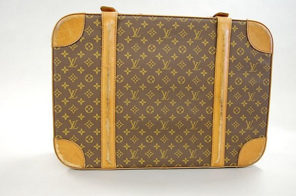 A Louis Vuitton soft-sided suitcase, probably 1960s - 2