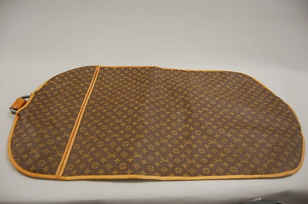A Louis Vuitton soft-sided suitcase, probably 1960s - 8