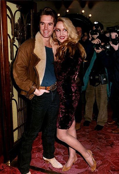 Antony Price and Bruce Oldfield cocktail dresses,: Antony Price and Bruce Oldfield cocktail dresses, 1980s-90s, labelled, one of deep purple crushed velvet with broad collar and plunging neckline; another of diagonally pleated and draped purple/black