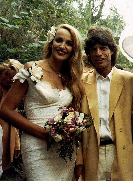 The Antony Price white lace dress Jerry Hall wore: The Antony Price white lace dress Jerry Hall wore for her wedding to Mick Jagger in 1990, labelled, the simple guipure gown with scalloped sweetheart neckline and hem, bust 86cm, 34in, waist 66cm 26in