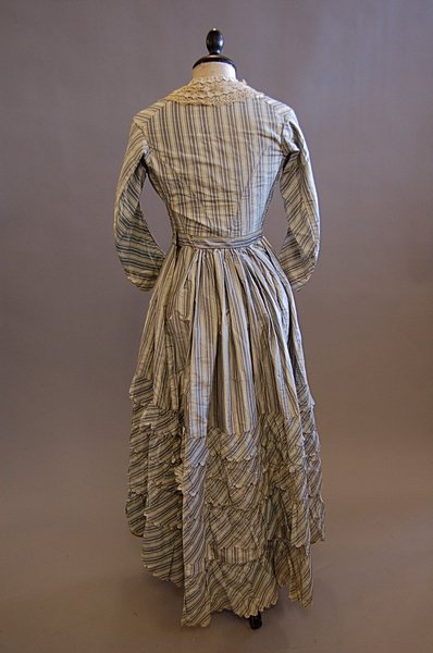A striped grey and blue taffeta gown, 1860s, with