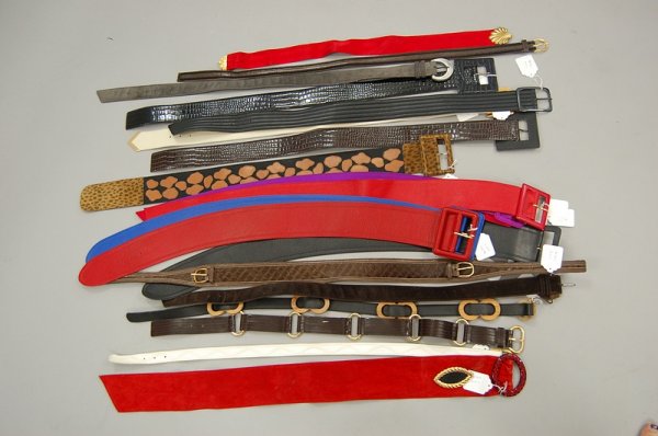 A group of belts, the majority by Yves Saint Laur