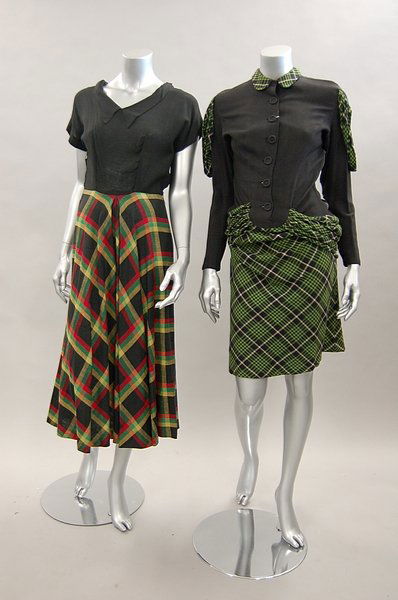 Five day dresses, 1940s to early 1950s, including: Five day dresses, 1940s to early 1950s, including black wool example with green tartan swags to hips and shoulders; St.Michael brown wool dress with Utility label; a CC41 printed floral apron, and oth