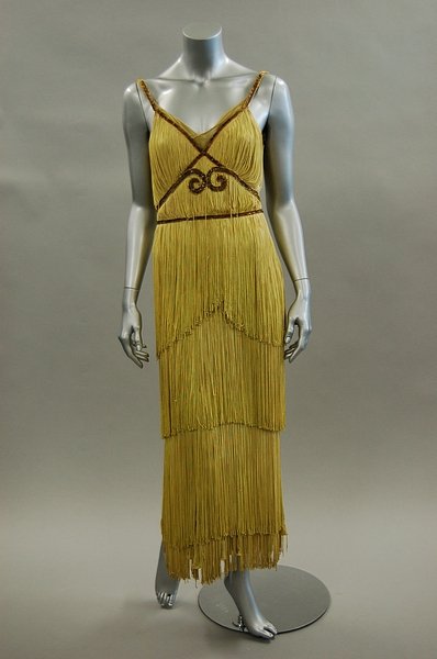 A multi- fringed "flapper" dress in 1920s style ma