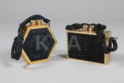 Two Fre-Mor beaded evening bags, 1940s, one hexagonal: Two Fre-Mor beaded evening bags, 1940s, one hexagonal with midnight blue beading, the other in black, both with engraved gilt mounts and bauble clasps, the larger 17.5cm long, a 1940s white beaded bag