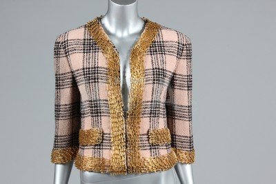 A Moschino Chanel-style safety-pin trimmed pink tweed: A Moschino Chanel-style safety-pin trimmed pink tweed jacket, Anniversary collection, 1993, labelled, chest 102cm, 40in; together with an Ungaro floral printed silk ensemble, 1980s, bust 92cm, 36in, w